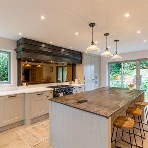 Manor House Painted Limestone with a Painted Anthracite bespoke Mantel and Dekton Trillium Worktops